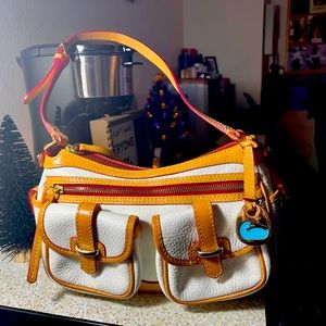 Dooney & Bourke white Carabao banana bag with dust cover